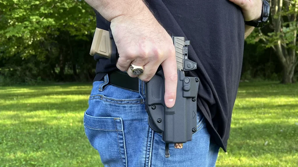 The Alien Gear Rapid Force LVL 2 Slim Holster fits the Glock 17 build beautifully and offers modular flexibility.