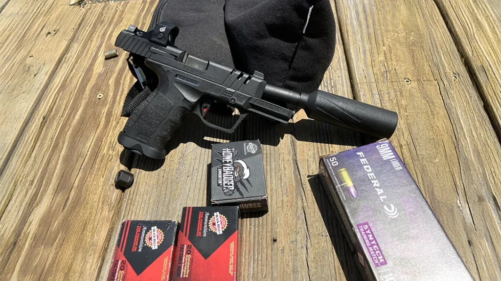 SOCOM Compact readily accepted modern accessories such as the Cyelee CATG Pro green dot and BANISH 9K suppressor.