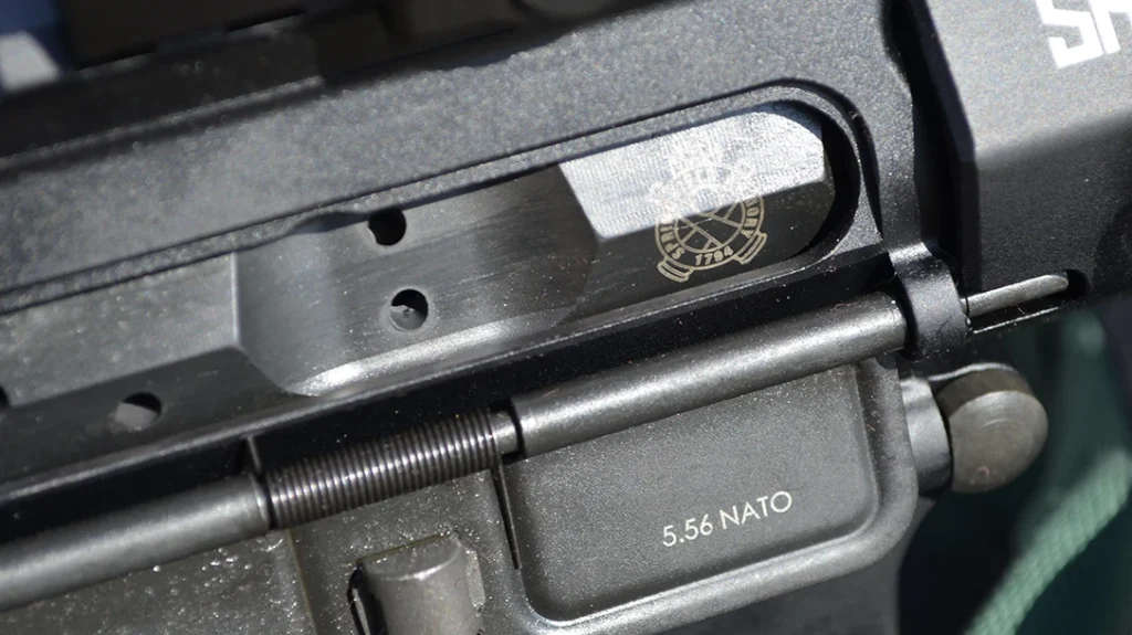 The bolt carrier group (BCG) is an enhanced M16-style with a 9310 steel bolt.