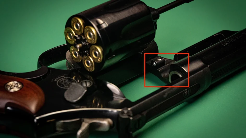 Snapping Revolvers: Most modern S&W revolvers also include a secondary detent at the front of the ejector rod.