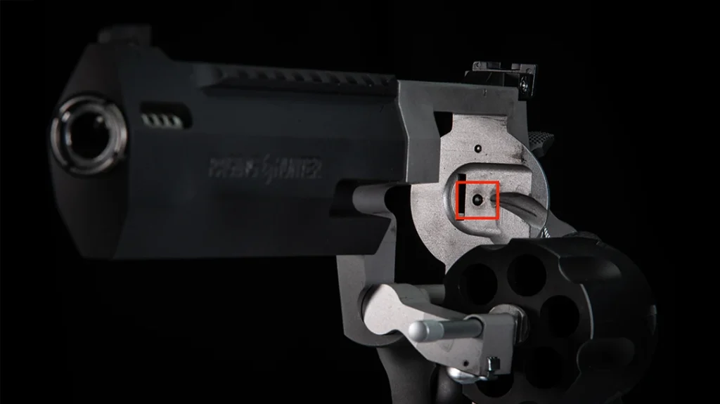 Snapping Revolvers: Colts, particularly the older models like the Python and Trooper series, rely on a larger cross pin that locks the cylinder in place.