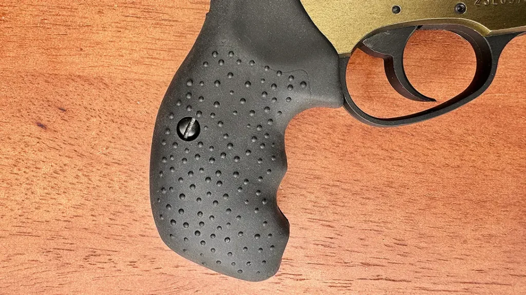 The Charter Arms Pathfinder II .22 LR comes with compact black rubber grips with finger grooves and pebble-grain texturing.