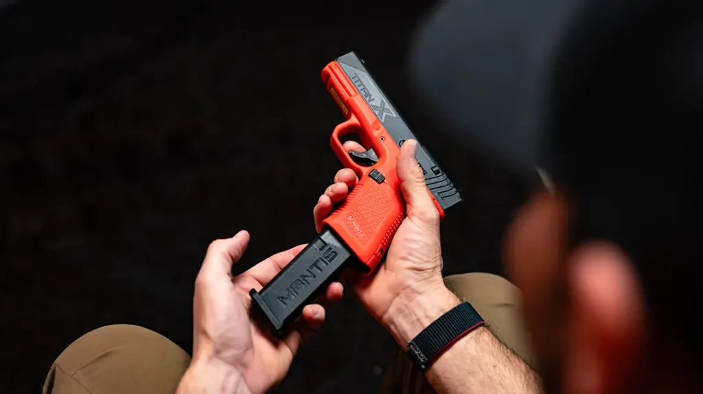 The Mantis TitanX Pistol comes with two weighted magazines for reload drills (the slide does not move).