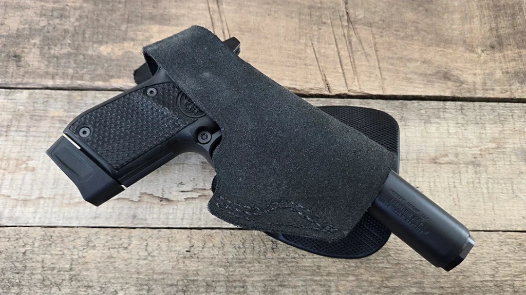 The paddle Lite has an open bottom that accommodates the Beretta 20X Bobcat with the Bowers Bitty suppressor installed, too.