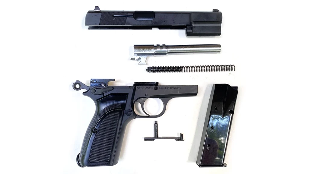 The Inglis pistol, though roll-marked L9A1 on the slide, appears more like a representative example of military contract Hi-Powers at the close of the Cold War than a precise copy of the British weapon.