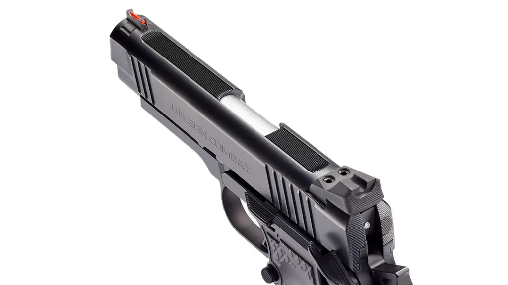 Wilson Combat equips the SFT9 with forward cocking serrations, fifteen fine glare-cut serrations along the top of the slide, and lateral serrations at the rear and on the sight.