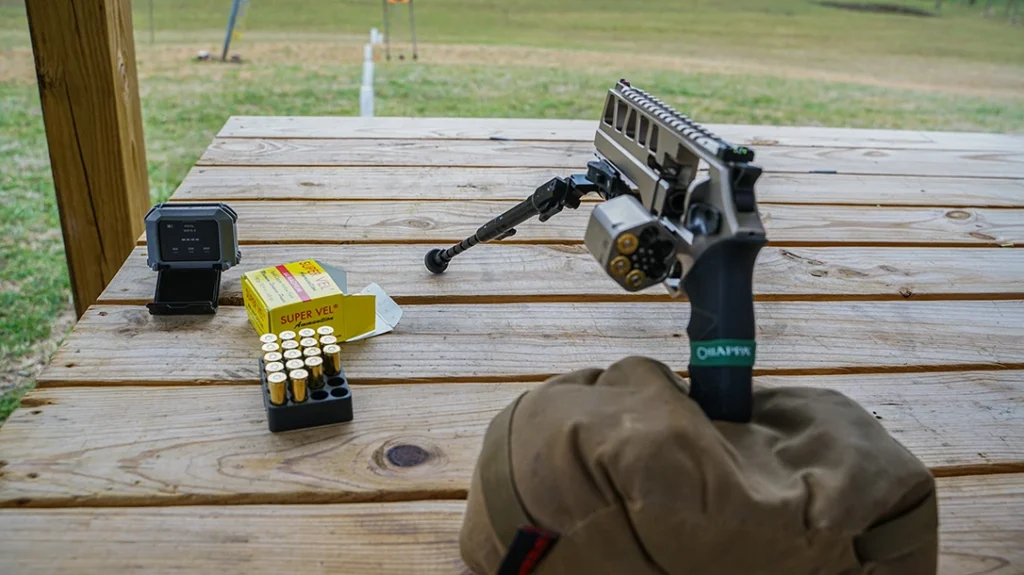 Instead of using a bag or a lead sled to sight this gun in, the author mounted the TBAC Bipod to the rail for maximum stability.