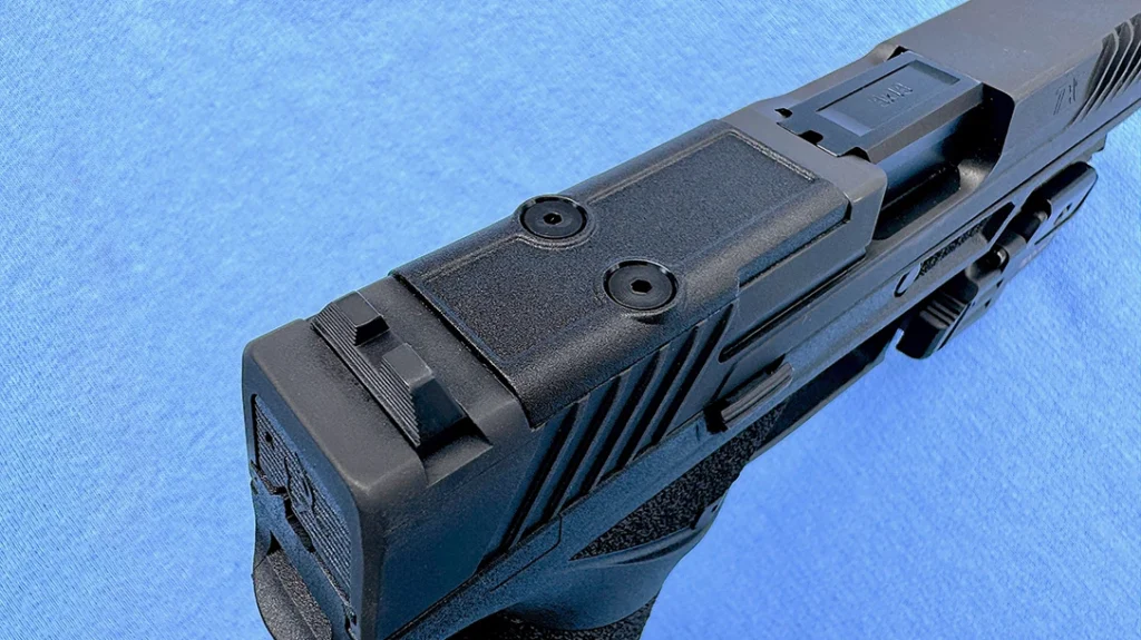 This striker-fired pistol has unified controls, T.O.R.O. slides for optics use, and a serialized chassis.